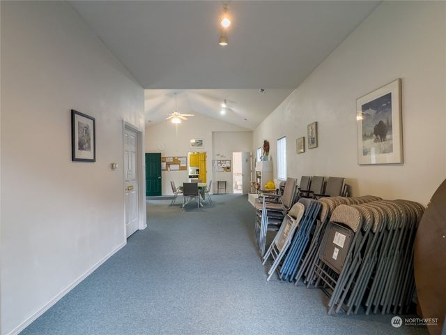 a view of a livingroom with furniture and a couch