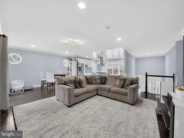 a living room with furniture and a couch