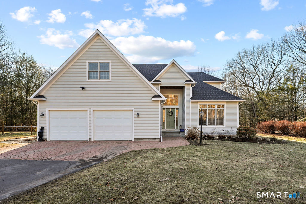 73 High Valley Drive Canton, CT 06019 - Photo 1 of 37 a view of a house with a yard