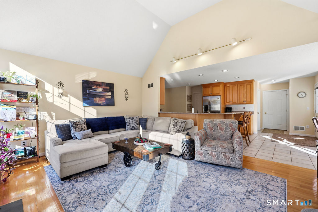 73 High Valley Drive Canton, CT 06019 - Photo 16 of 37 a living room with furniture and a couch