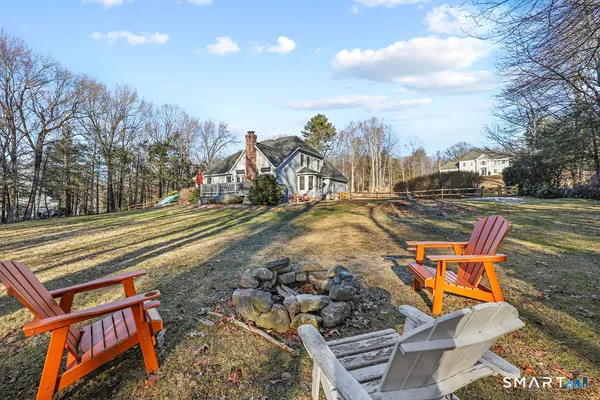 a view of a patio with a yard