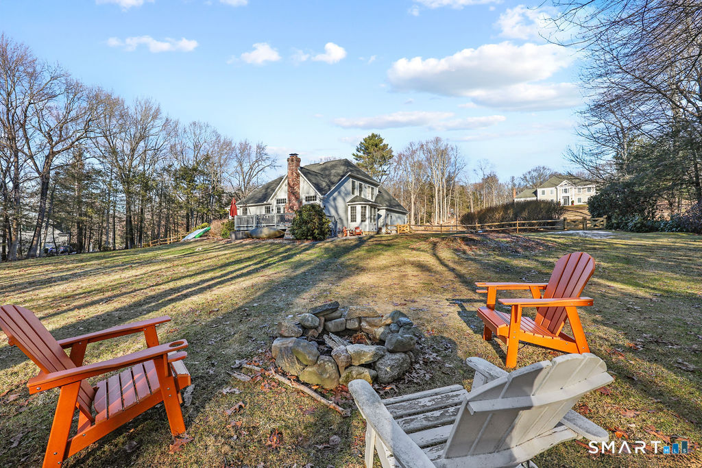 73 High Valley Drive Canton, CT 06019 - Photo 7 of 37 a view of a patio with a yard