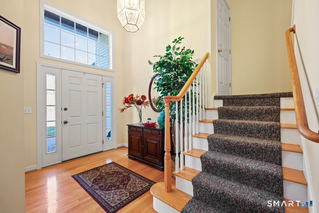 73 High Valley Drive Canton, CT 06019 - Photo 10 of 37 a view of entryway with wooden floor