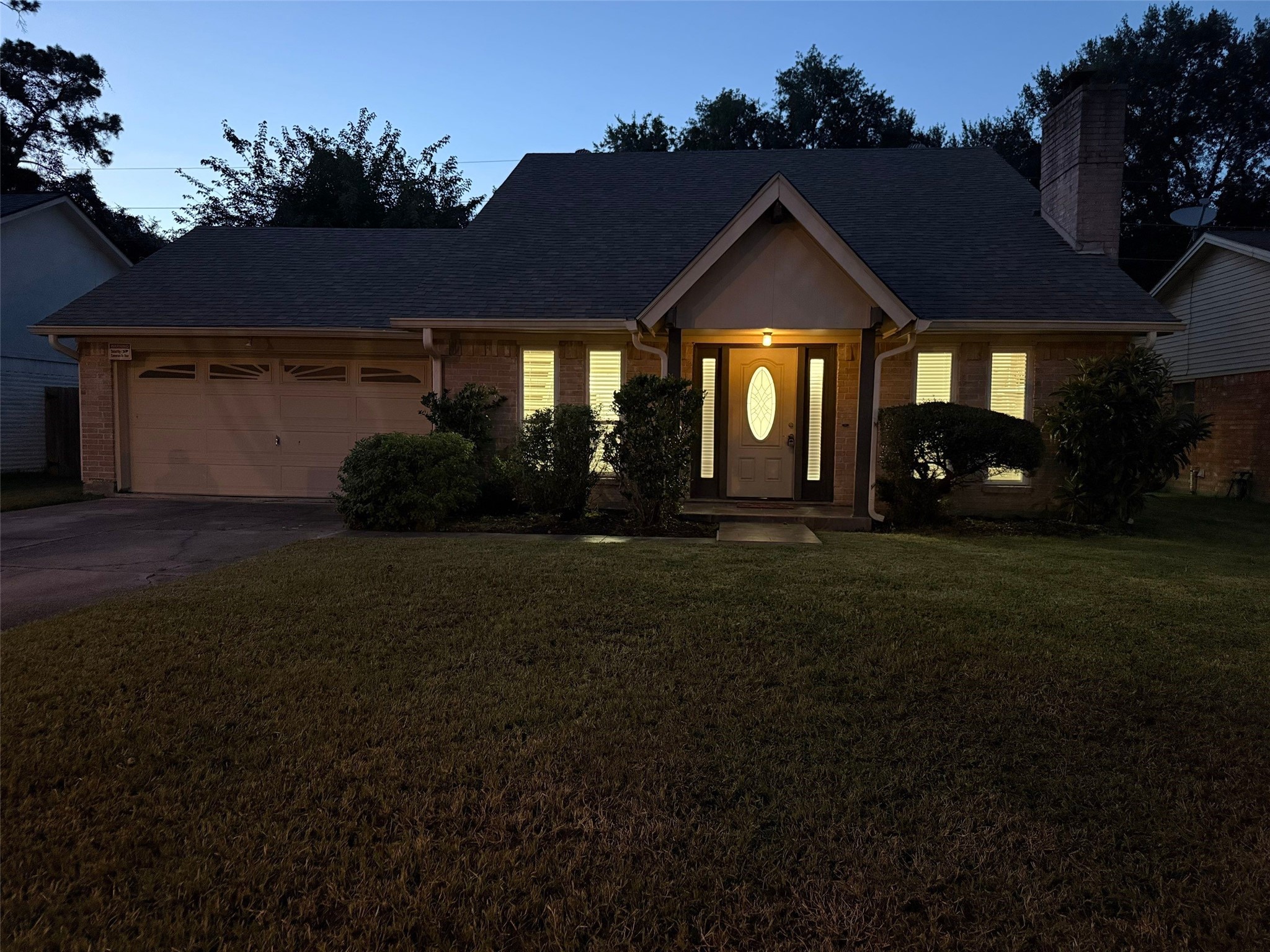 9626 Magnolia Ridge Drive Houston, TX 77070 - Photo 39 of 40 a front view of a house with a yard