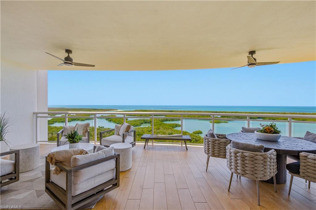 13925 Old Coast Road, Unit 1706 Naples, FL 34110 - Photo 26 of 37 a view of swimming pool with outdoor seating and couches