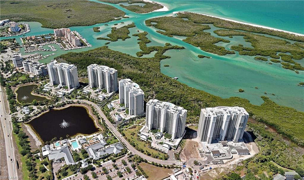 13925 Old Coast Road, Unit 1706 Naples, FL 34110 - Photo 27 of 37 a view of swimming pool from a balcony