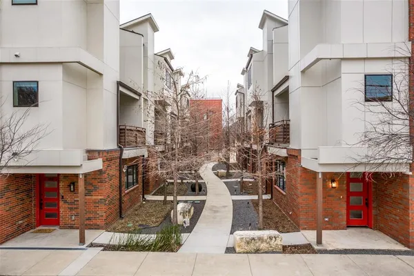 a view of city with tall buildings