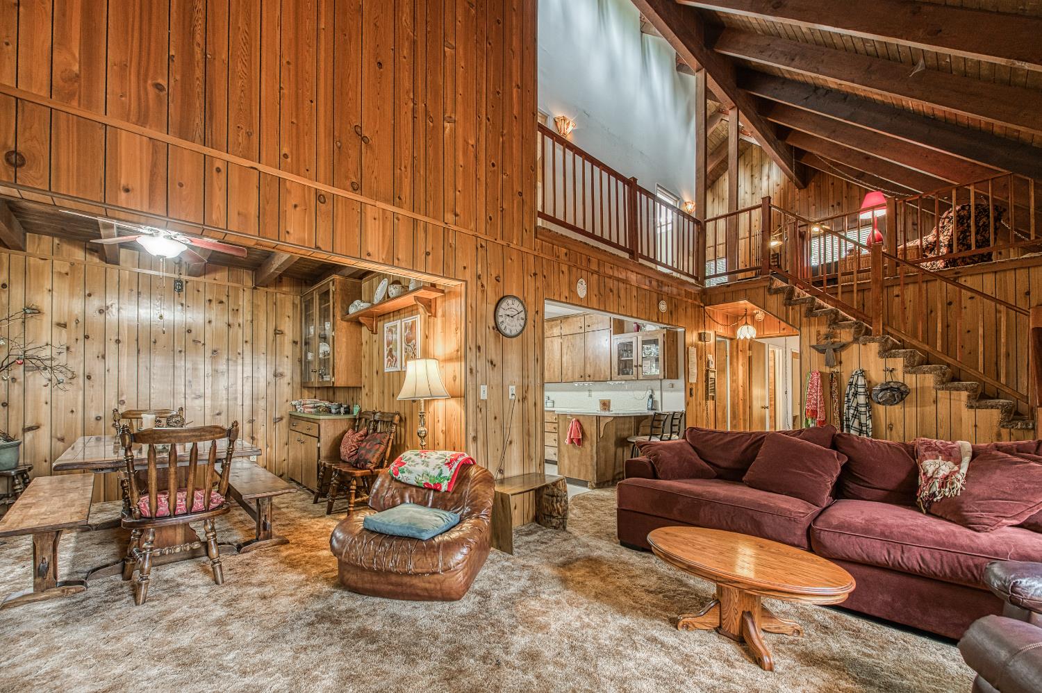 42303 Hanging Branch Road Shaver Lake, CA 93664 - Photo 11 of 39 a view of a patio with couches and potted plants