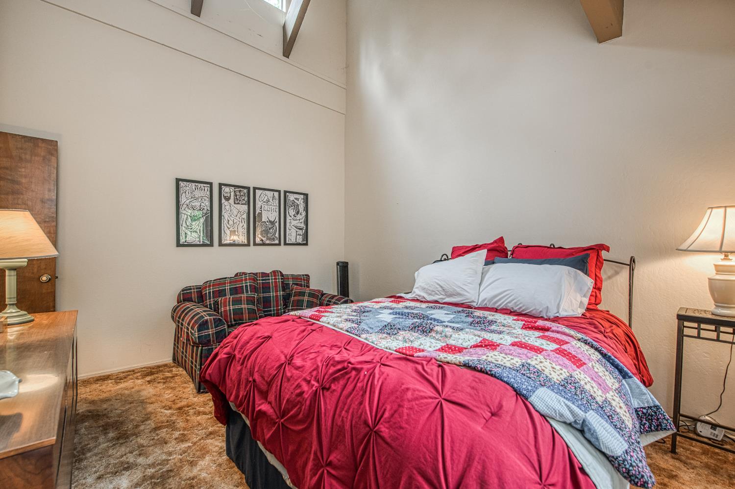 42303 Hanging Branch Road Shaver Lake, CA 93664 - Photo 34 of 39 a bedroom with a bed and a lamp