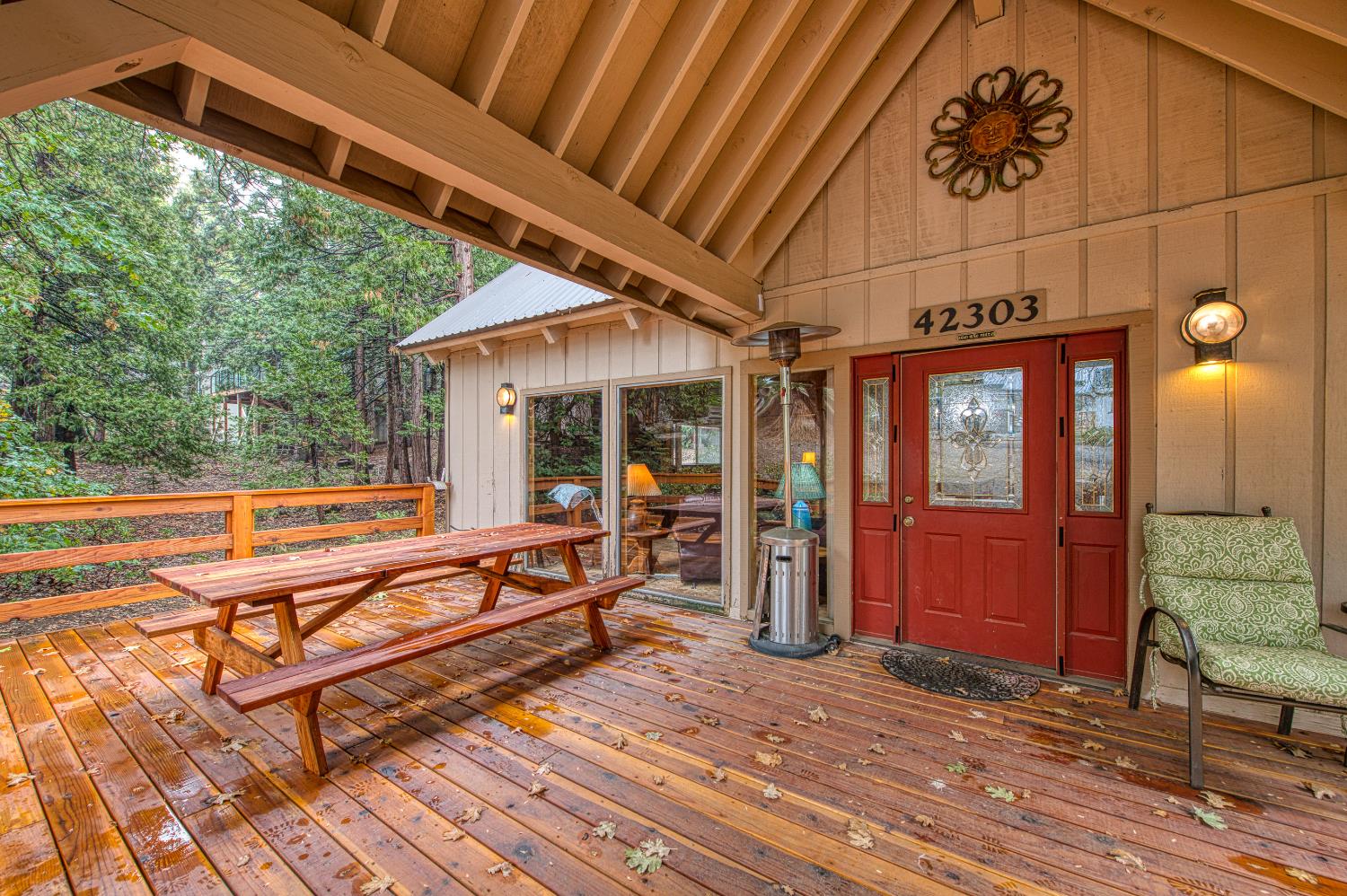 42303 Hanging Branch Road Shaver Lake, CA 93664 - Photo 35 of 39 a view of a living room and outdoor space