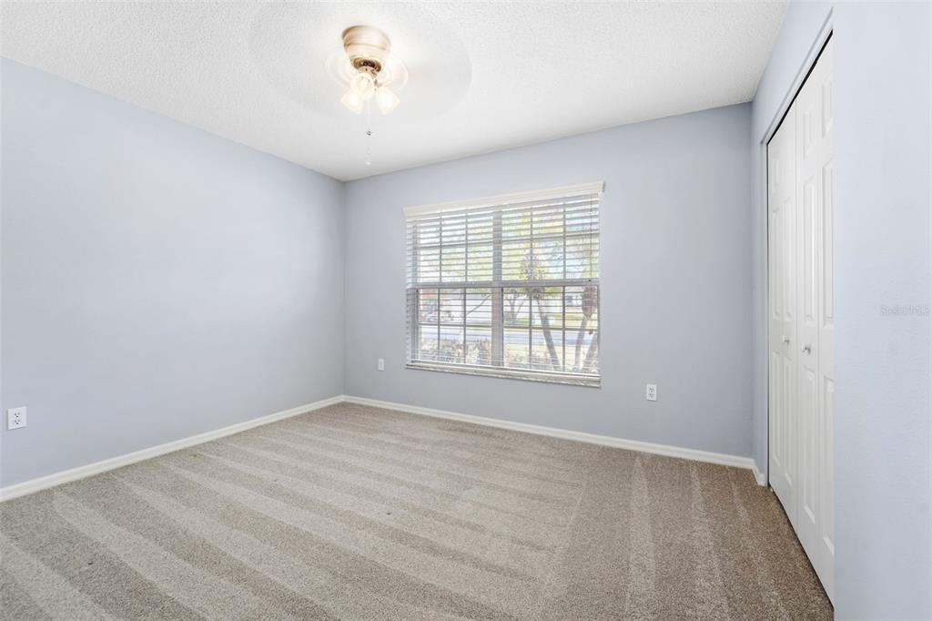 1031 Almondwood Drive Trinity, FL 34655 - Photo 20 of 49 a view of an empty room with a window
