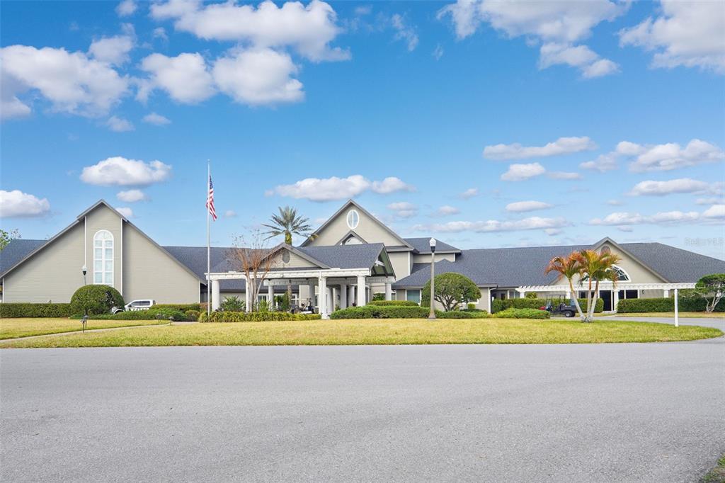 1031 Almondwood Drive Trinity, FL 34655 - Photo 31 of 49 a view of swimming pool in the backyard of house along with outdoor seating
