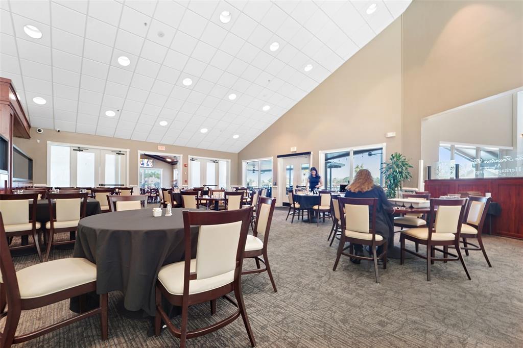 1031 Almondwood Drive Trinity, FL 34655 - Photo 40 of 49 a view of a dining room with furniture