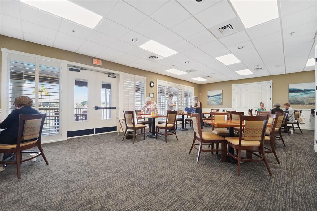 1031 Almondwood Drive Trinity, FL 34655 - Photo 41 of 49 a view of a dining room with furniture