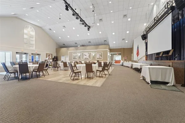 a view of house with swimming pool