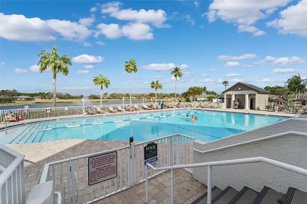 a view of swimming pool from a balcony