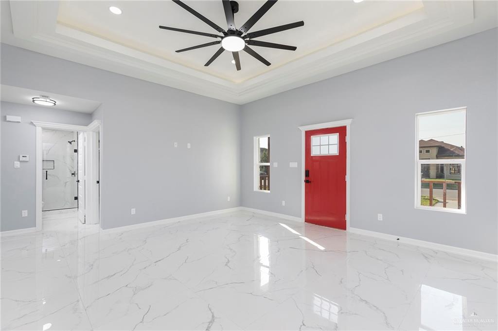 6809 South Oro Lane Pharr, TX 78577 - Photo 3 of 17 a view of an empty room with a window