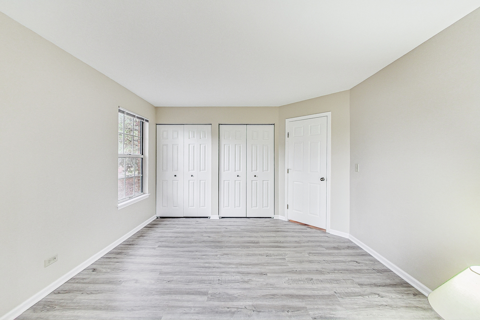 1006 Butternut Lane, Unit B Mount Prospect, IL 60056 - Photo 11 of 26 a view of a livingroom with wooden floor