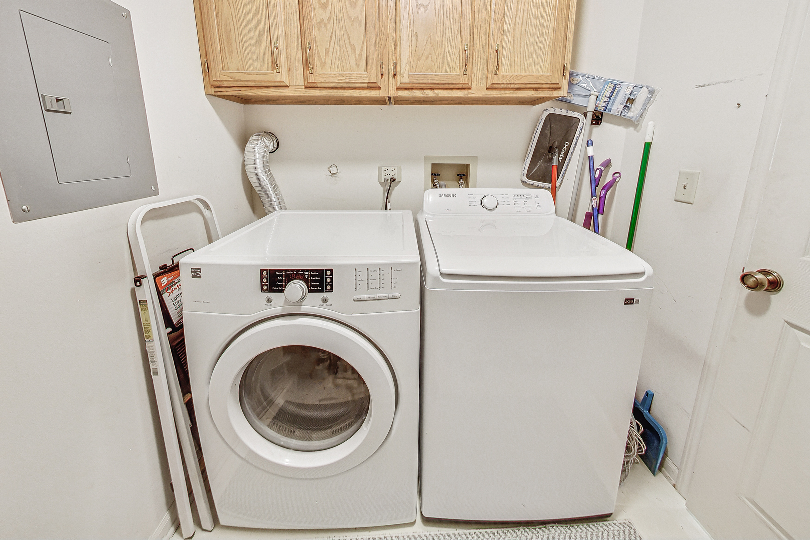 1006 Butternut Lane, Unit B Mount Prospect, IL 60056 - Photo 21 of 26 a utility room with dryer and washer