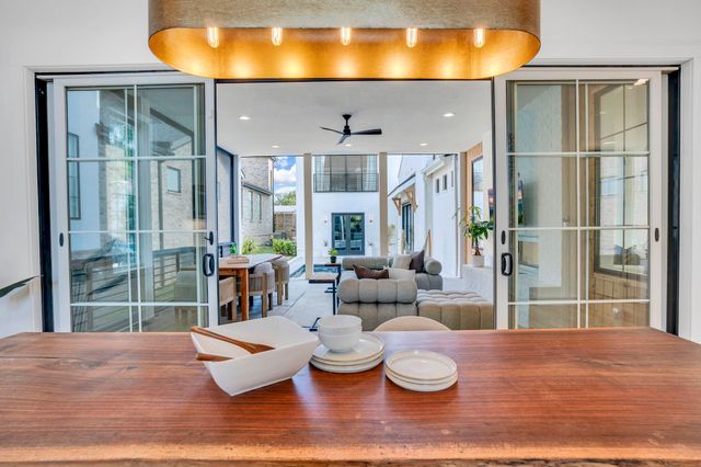 a bedroom with a bed and a mirror