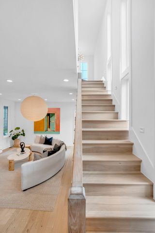 a utility room with sink dryer and washer