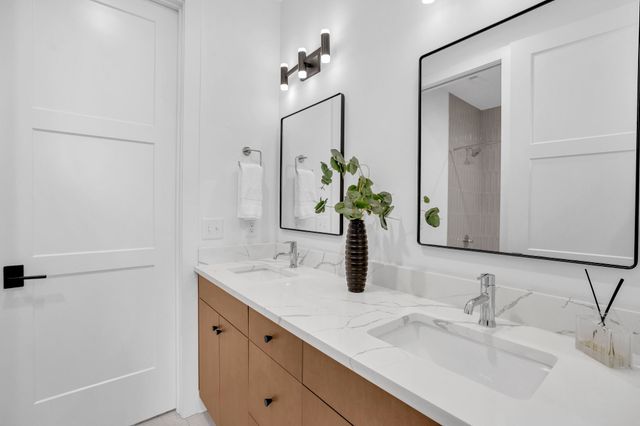 a front view of a house with a garage