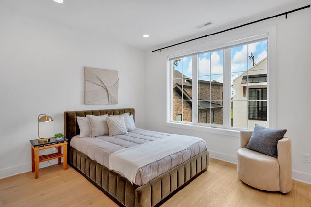 an aerial view of multiple houses with outdoor space