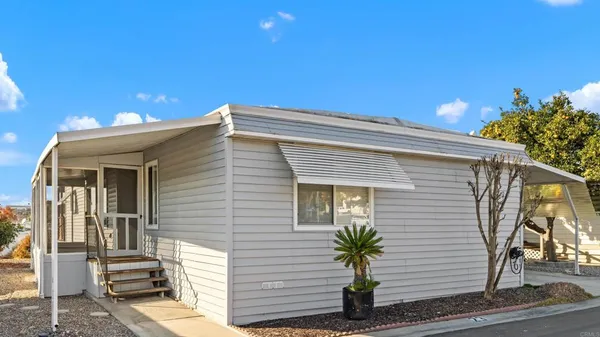 a view of a house with a garage
