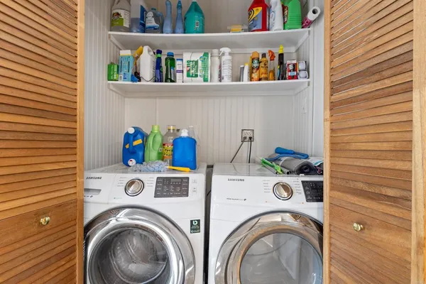 a utility room with dryer and washer