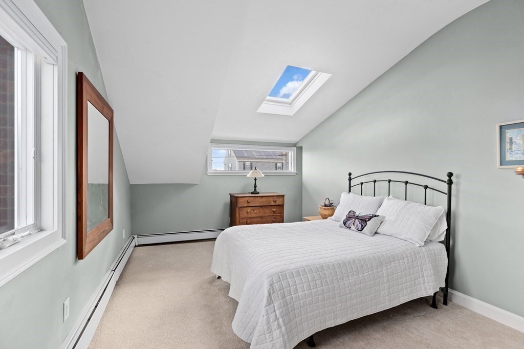 21 5th Avenue Scituate, MA 02066 - Photo 27 of 40 a bedroom with a bed and window
