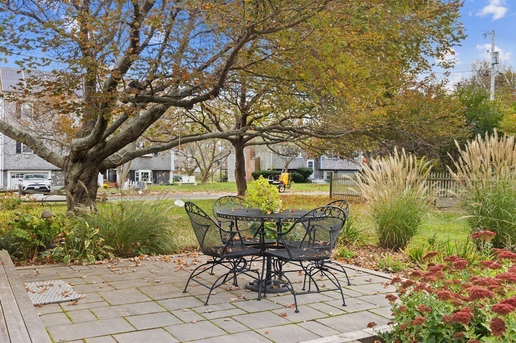 21 5th Avenue Scituate, MA 02066 - Photo 33 of 40 a view of a chairs and table in the garden