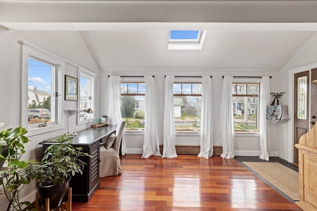 21 5th Avenue Scituate, MA 02066 - Photo 4 of 40 a living room with furniture and wooden floor