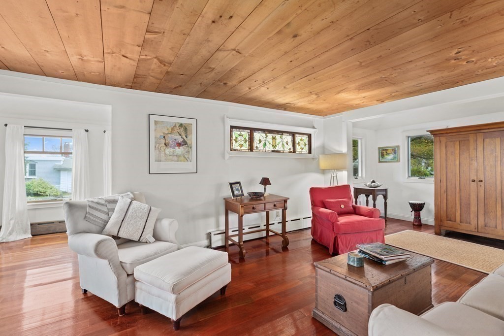 21 5th Avenue Scituate, MA 02066 - Photo 7 of 40 a living room with furniture and wooden floor
