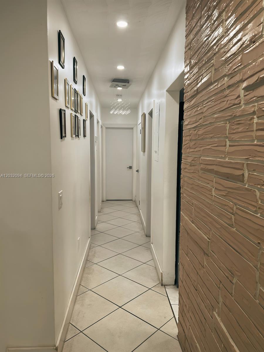 6492 Southwest 25th Street Miramar, FL 33023 - Photo 5 of 9 a view of a hallway