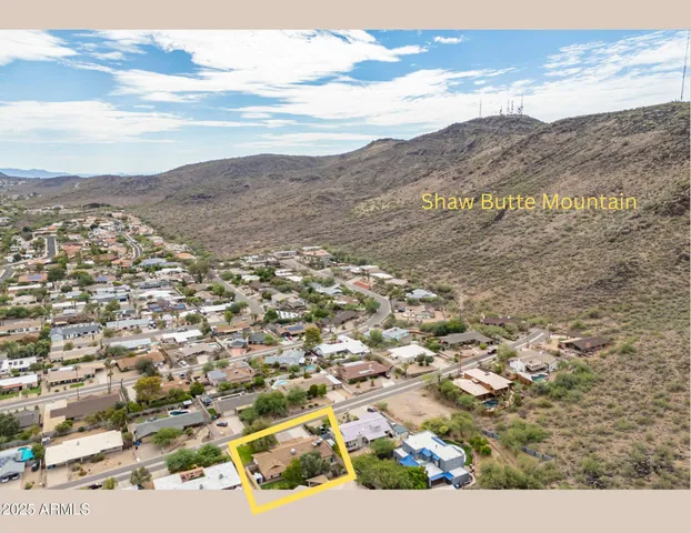 a view of city and mountain