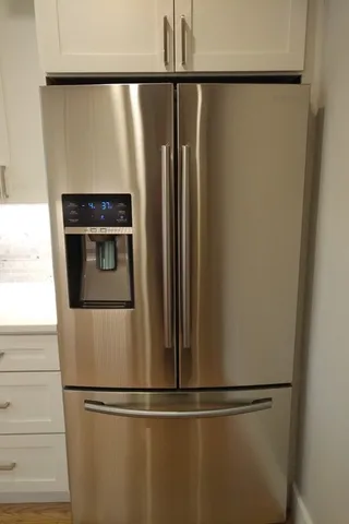 a close view of a refrigerator in kitchen