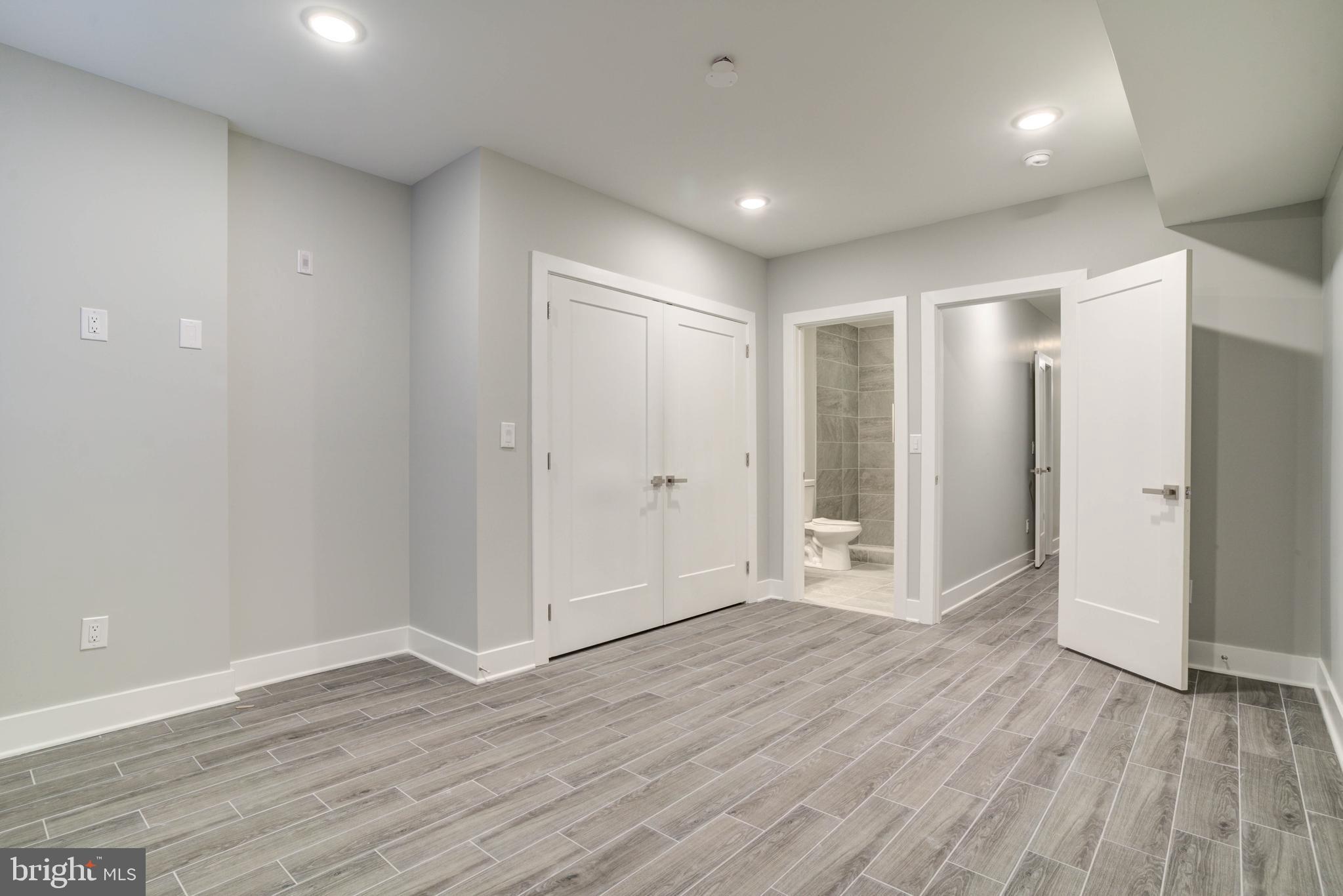 5005 Walnut Street Philadelphia, PA 19139 - Photo 6 of 39 a view of empty room with wooden floor