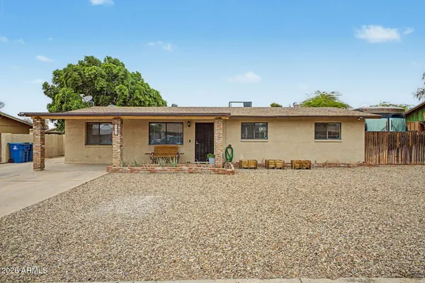 front view of house with a yard