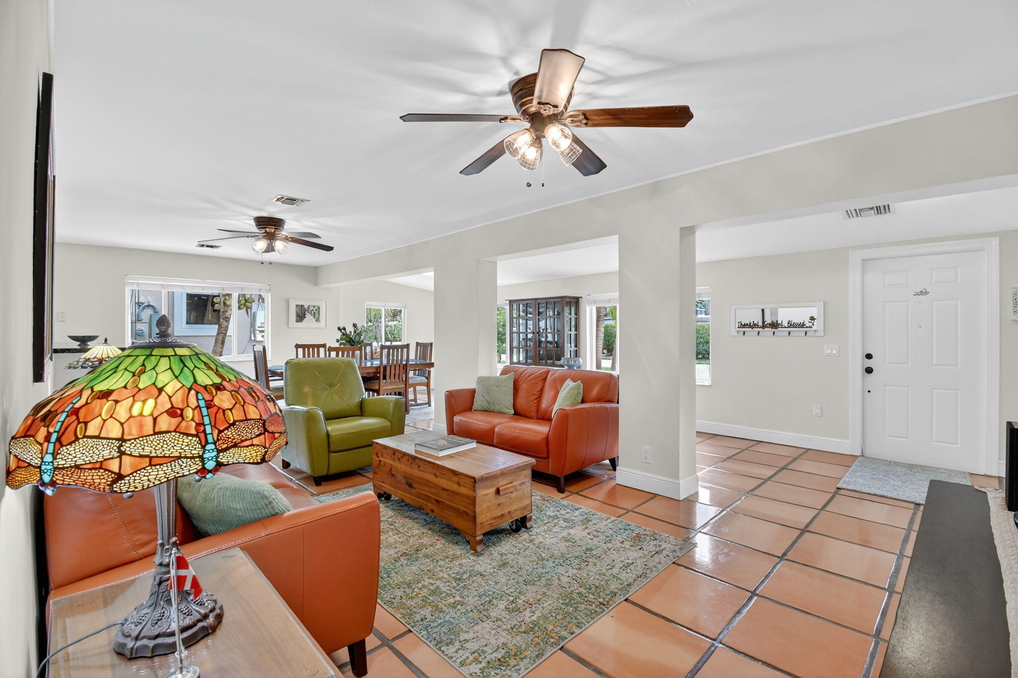 1309 Southwest 19th Avenue Fort Lauderdale, FL 33312 - Photo 11 of 66 a living room with furniture and a chandelier