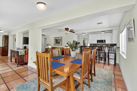 a view of a livingroom with furniture and a window