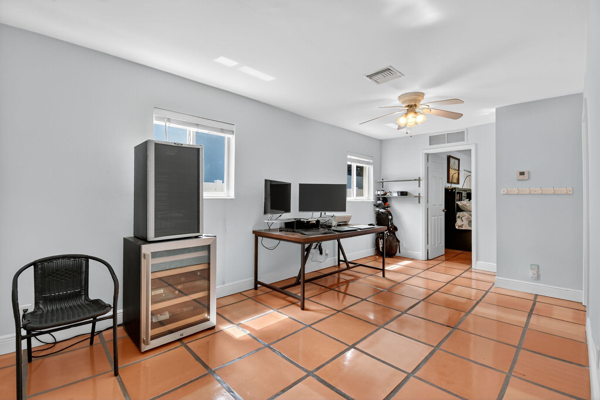 1309 Southwest 19th Avenue Fort Lauderdale, FL 33312 - Photo 33 of 66 a living room with furniture and a flat screen tv
