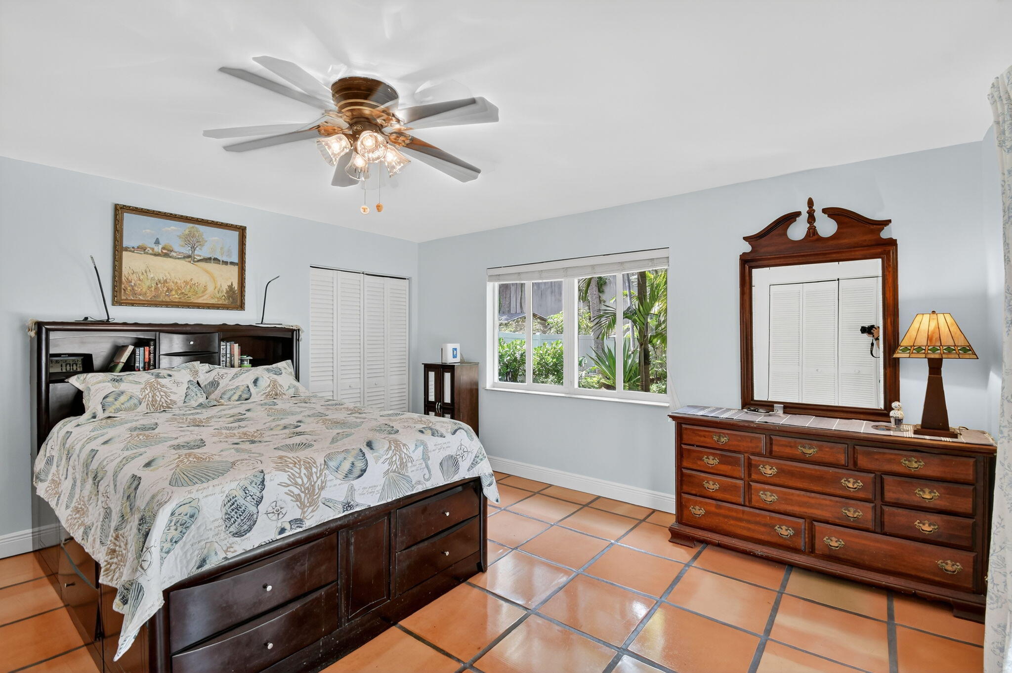 1309 Southwest 19th Avenue Fort Lauderdale, FL 33312 - Photo 37 of 66 a bedroom with a bed and a chandelier