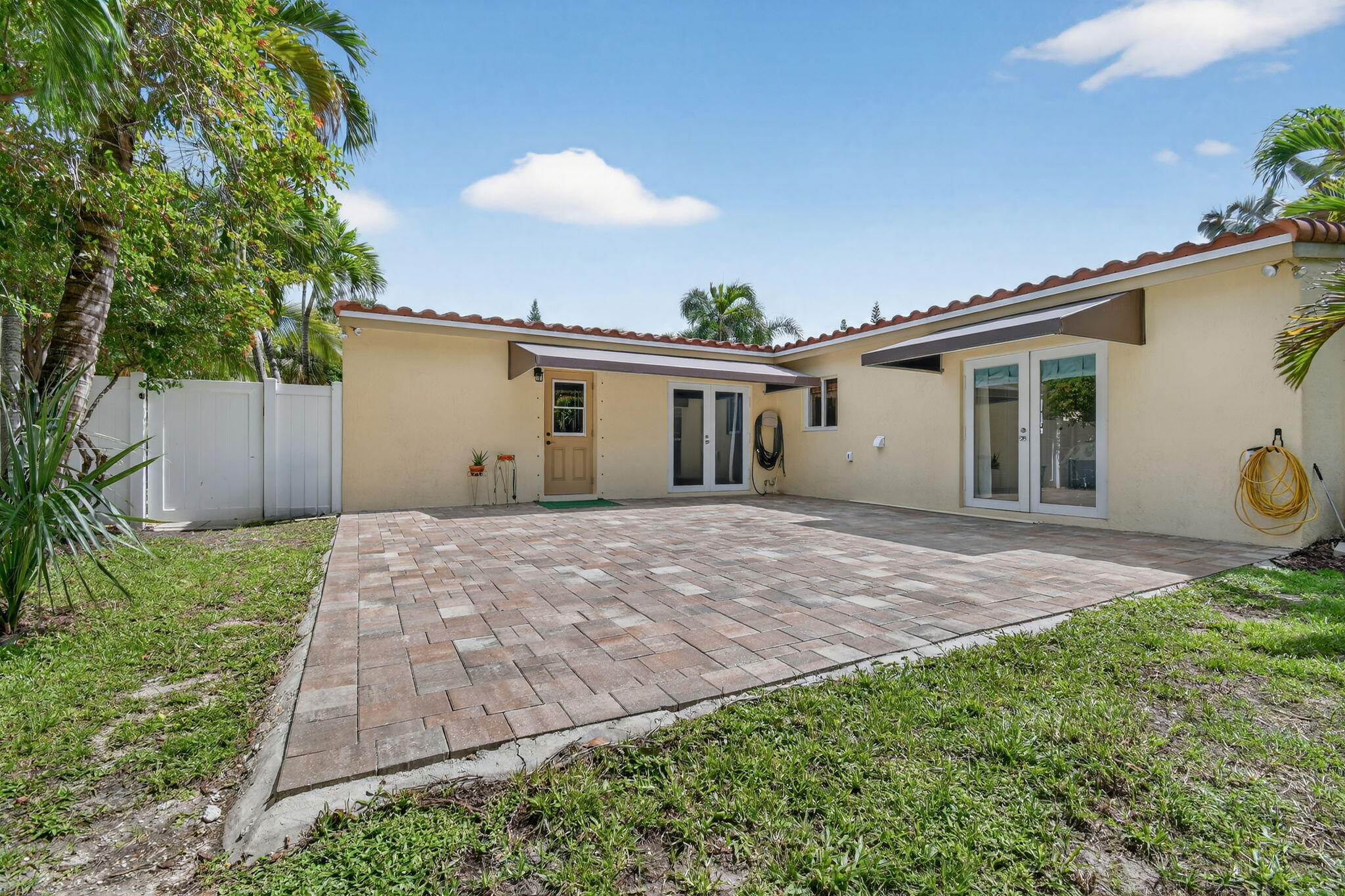 1309 Southwest 19th Avenue Fort Lauderdale, FL 33312 - Photo 46 of 66 a view of a backyard with a garden and a tree