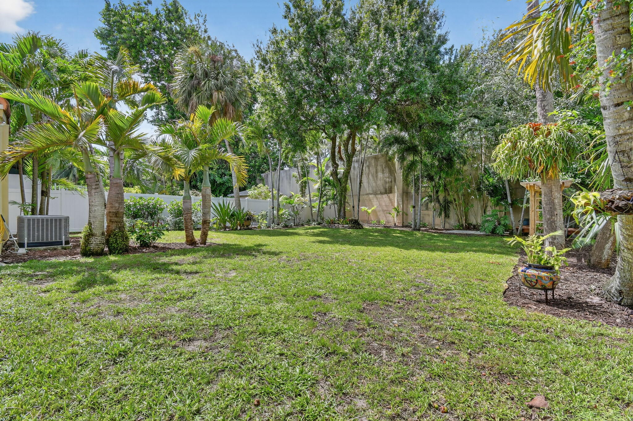 1309 Southwest 19th Avenue Fort Lauderdale, FL 33312 - Photo 47 of 66 a view of a backyard with large trees
