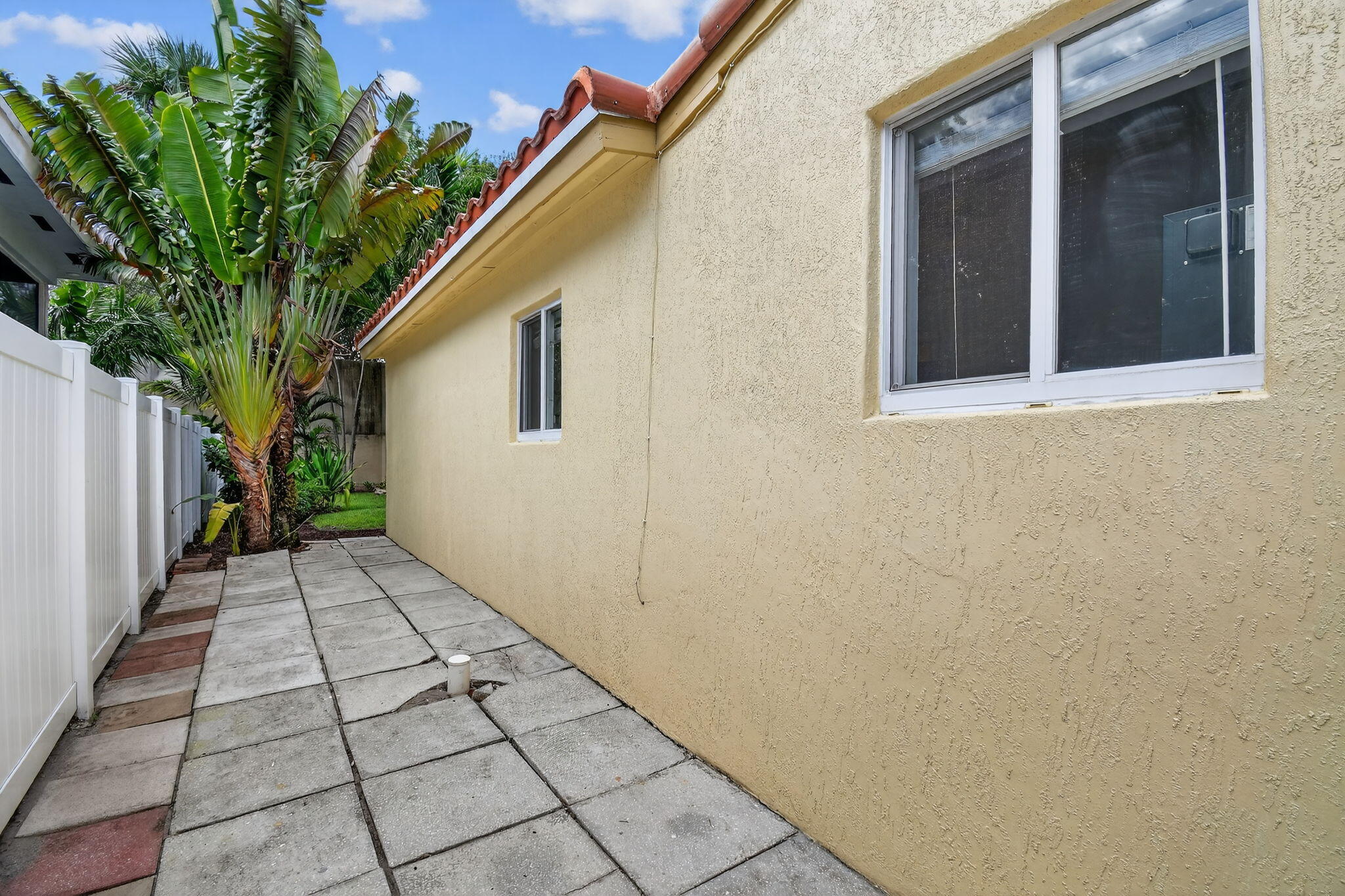 1309 Southwest 19th Avenue Fort Lauderdale, FL 33312 - Photo 48 of 66 a view of a house with a pathway