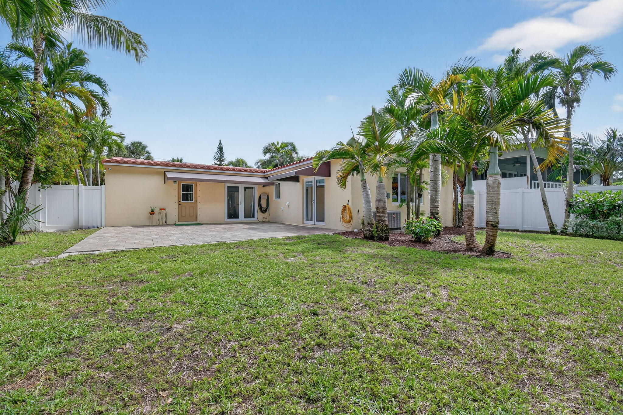 1309 Southwest 19th Avenue Fort Lauderdale, FL 33312 - Photo 50 of 66 a view of a house with backyard and a tree