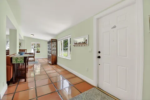 a room with window and walk in closet