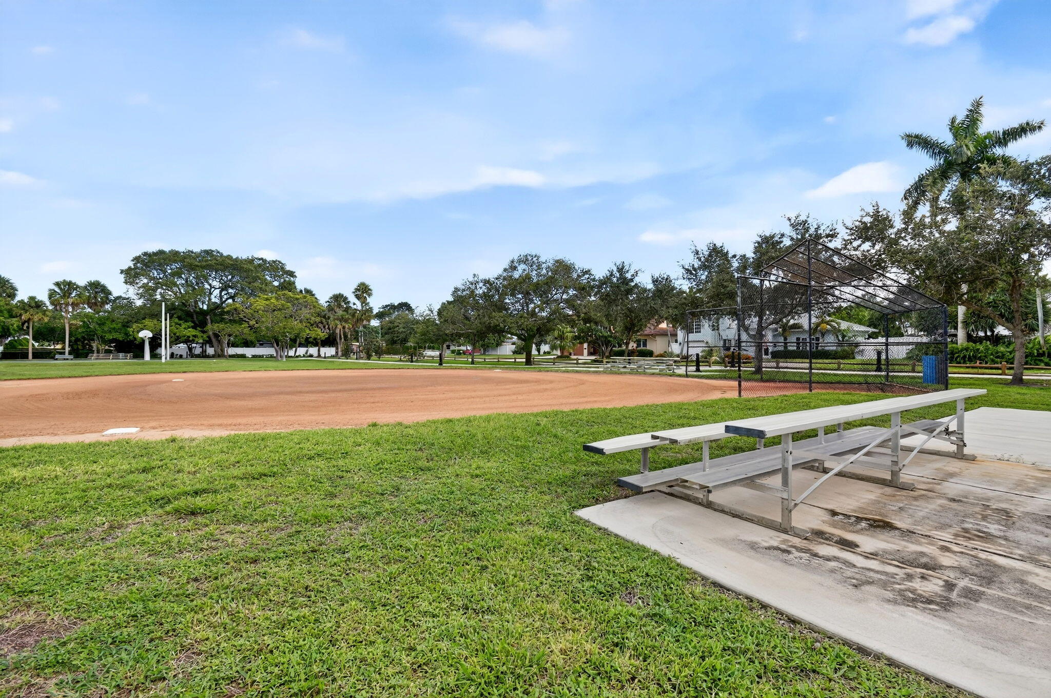 1309 Southwest 19th Avenue Fort Lauderdale, FL 33312 - Photo 62 of 66 a view of a swimming pool with a yard and palm trees