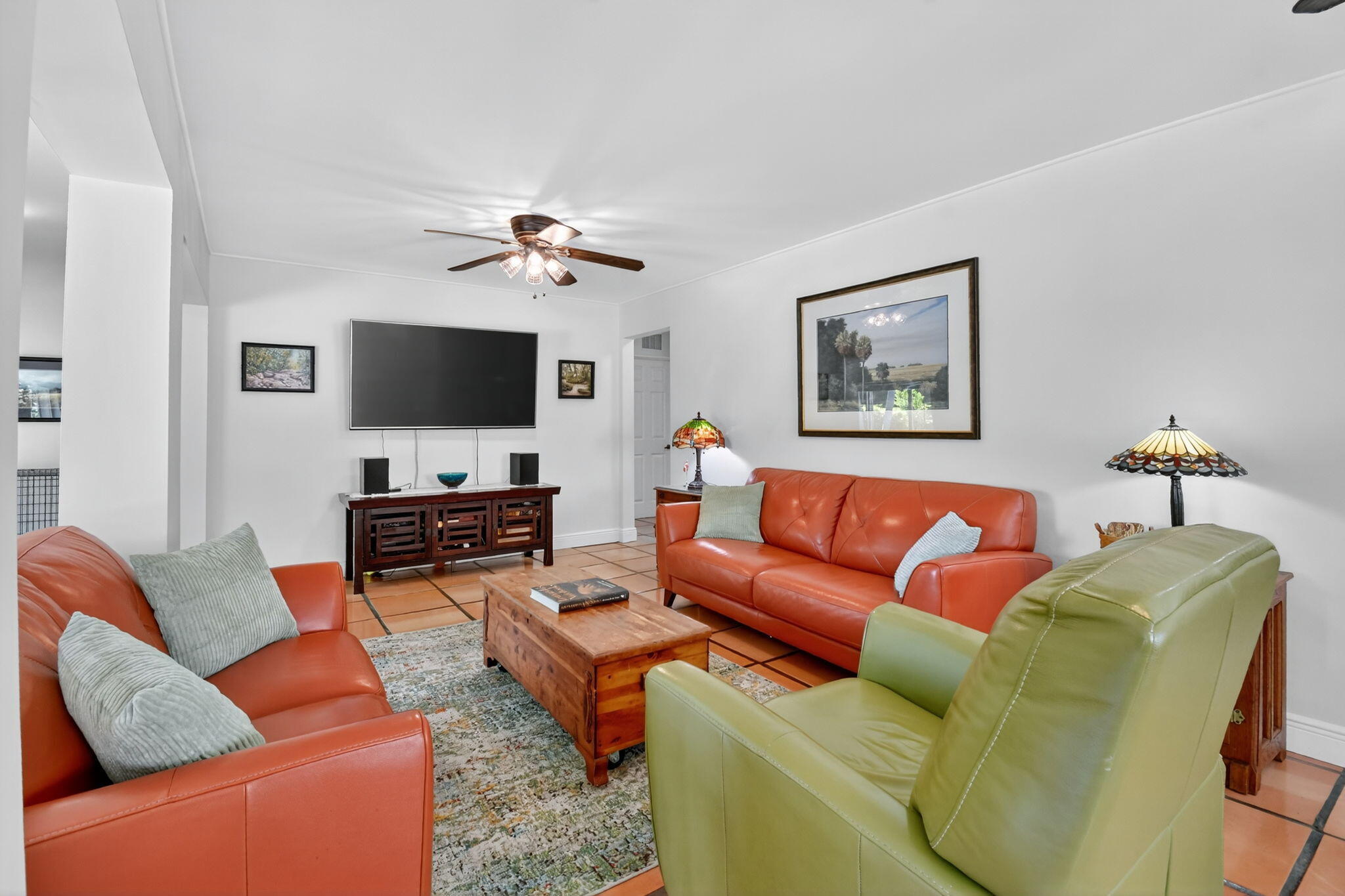 1309 Southwest 19th Avenue Fort Lauderdale, FL 33312 - Photo 9 of 66 a living room with furniture and a flat screen tv