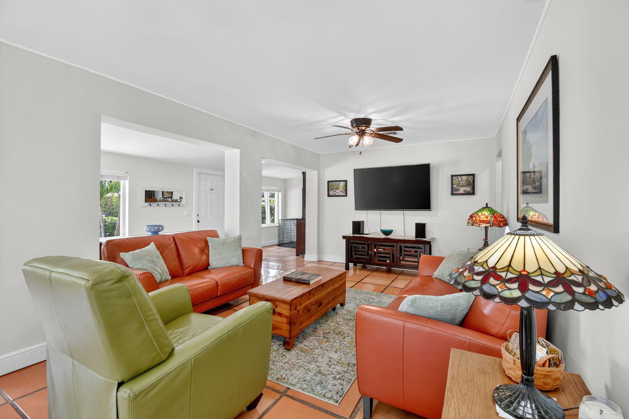 1309 Southwest 19th Avenue Fort Lauderdale, FL 33312 - Photo 10 of 66 a living room with furniture and a flat screen tv